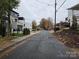 Residential street lined with houses and trees at 316 Frazier Ave, Charlotte, NC 28216