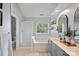 Double vanity bathroom with soaking tub and shower at 4131 Huntmeadow Dr, Charlotte, NC 28269