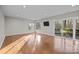 Spacious basement with hardwood floors and large windows at 9334 Hunting Ct, Matthews, NC 28105