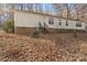 Single-wide mobile home with steps and a yard at 12813 Peppercorn Ln, Midland, NC 28107