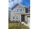 Two-story house with gray siding and a front porch at 14042 Aikenwood Dr, Charlotte, NC 28278