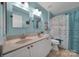 Clean bathroom with a double vanity and beach-themed decor at 1437 Autumn Ridge Ln, Fort Mill, SC 29708