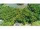 Wooded lot with lake access and nearby homes at 168 Wylie Trl, Statesville, NC 28677
