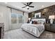 Spacious bedroom with large windows, ceiling fan, and stylish decor at 1728 Blanche St, Charlotte, NC 28262