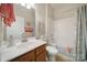 Bathroom with tub, shower, and updated vanity at 2006 Wheatfield Ct, Fort Mill, SC 29707