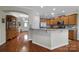 Well-equipped kitchen featuring granite countertops and hardwood floors at 2011 Vermount Way, Fort Mill, SC 29707