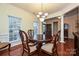 Formal dining room with hardwood floors and a view of the entryway at 20204 Amy Lee Dr, Cornelius, NC 28031