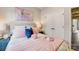 Bright bedroom with a comfortable queen bed and stylish decor at 207 Tamala St, Davidson, NC 28036