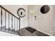 Bright entryway with modern staircase and mirror at 207 Tamala St, Davidson, NC 28036