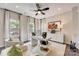 Bright home office features large windows, built-in shelving, and comfortable seating at 207 Tamala St, Davidson, NC 28036