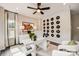 Stylish home office with a unique record wall and ample light at 207 Tamala St, Davidson, NC 28036