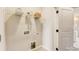 Convenient laundry room with shelving and built-in storage at 207 Tamala St, Davidson, NC 28036