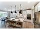 Modern kitchen with white cabinets, quartz countertops, and an island with seating at 5100 Verona Rd # 96, Charlotte, NC 28213