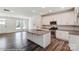 Open concept kitchen with an island and stainless steel appliances at 5544 Stafford Rd # 30, Charlotte, NC 28215