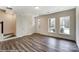 Spacious living area with hardwood floors and natural light at 5544 Stafford Rd # 30, Charlotte, NC 28215