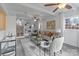 Bright living room features hardwood floors, a cozy seating area, and built-in shelving at 6108 Netherwood Dr, Charlotte, NC 28210