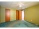 Spacious bedroom with carpet and double doors at 680 Plainview Estate Ln, Vale, NC 28168