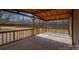 Relaxing screened porch overlooking the backyard at 680 Plainview Estate Ln, Vale, NC 28168