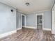 Spacious living area with hardwood floors and grey walls at 823 Frederick St, Shelby, NC 28150