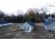 Aerial view of a one-story home with backyard and surrounding properties at 1014 Kansas St, Kannapolis, NC 28083