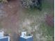 Aerial view of a backyard with a fire pit at 1014 Kansas St, Kannapolis, NC 28083