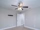 Empty bedroom with neutral-colored walls and ceiling fan at 1014 Kansas St, Kannapolis, NC 28083