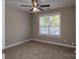 Empty bedroom with neutral carpet and window at 1014 Kansas St, Kannapolis, NC 28083