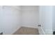 Walk-in closet with wire shelving and carpeted floor at 1014 Kansas St, Kannapolis, NC 28083