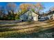 Backyard of a one-story home with a grassy lawn at 1014 Kansas St, Kannapolis, NC 28083
