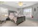 Charming bedroom with window seat and comfortable bedding at 10121 Enfield Ct, Fort Mill, SC 29707