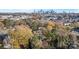 Aerial view of property with city skyline in the distance at 1522 Princess Pl, Charlotte, NC 28208