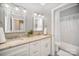 Modern bathroom with double vanity and a shower/tub combo at 180 Sink Farm Rd, Mooresville, NC 28115