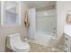 Bathroom with shower/tub combo and white toilet at 240 Quail Dr, Salisbury, NC 28147