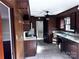 Dark wood kitchen with appliances and ample counter space at 2511 Pickwick Pl, Lincolnton, NC 28092