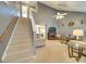 Living room with stairs and a view of kitchen at 2726 Thistle Brook Dr, Concord, NC 28027