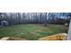 Large backyard with wooden deck and storage sheds at 3431 Polkville Rd, Shelby, NC 28150