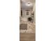 Bathroom featuring a corner soaking tub and updated flooring at 3431 Polkville Rd, Shelby, NC 28150