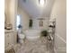 Bathroom with corner bathtub, tiled flooring, and a modern design at 3431 Polkville Rd, Shelby, NC 28150