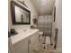 Bright bathroom with vanity, toilet and shower/tub combo at 3431 Polkville Rd, Shelby, NC 28150
