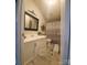 Bathroom with updated vanity and flooring at 3431 Polkville Rd, Shelby, NC 28150