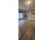 Bedroom with hardwood floors and a window with blinds at 3431 Polkville Rd, Shelby, NC 28150