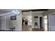 Open concept living room with kitchen view and stylish decor at 3431 Polkville Rd, Shelby, NC 28150