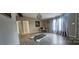 Living room with hardwood floors, stylish decor, and large windows at 3431 Polkville Rd, Shelby, NC 28150