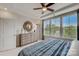 Spacious bedroom with large windows and a dresser at 5015 Westmead Ln, Charlotte, NC 28262