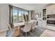 Elegant dining area with built-in cabinetry and a wine cooler at 5015 Westmead Ln, Charlotte, NC 28262