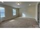 Spacious bedroom with carpet, neutral walls, and natural light at 563 Old Camden Monroe Hwy, Lancaster, SC 29720