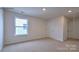 Spacious bedroom with neutral walls and carpet at 589 N Sparkleberry St, Chester, SC 29706