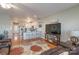 Bright living room with hardwood floors and open concept design at 638 Deerfield Rd, Mount Gilead, NC 27306