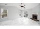 Living room with fireplace, vaulted ceiling, and marble-look floors at 7618 Berrywood Cir, Huntersville, NC 28078