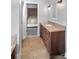 Bathroom with granite countertop and double sink vanity at 807 Lauras Ln, Albemarle, NC 28001